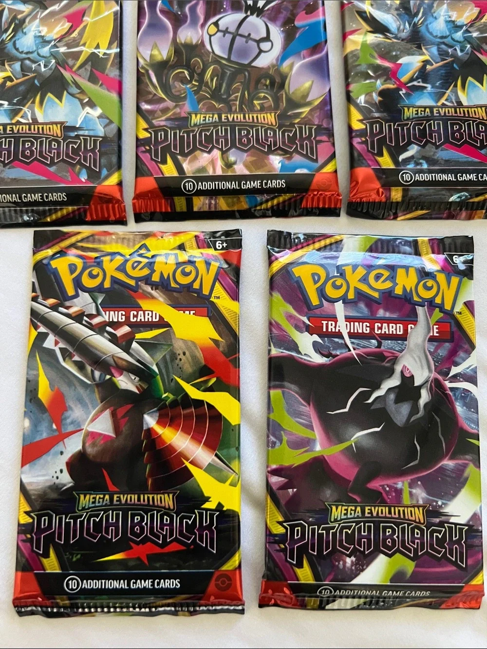 Pokemon Pitch Black Booster Packs - Yellow, Black, Purple, Red